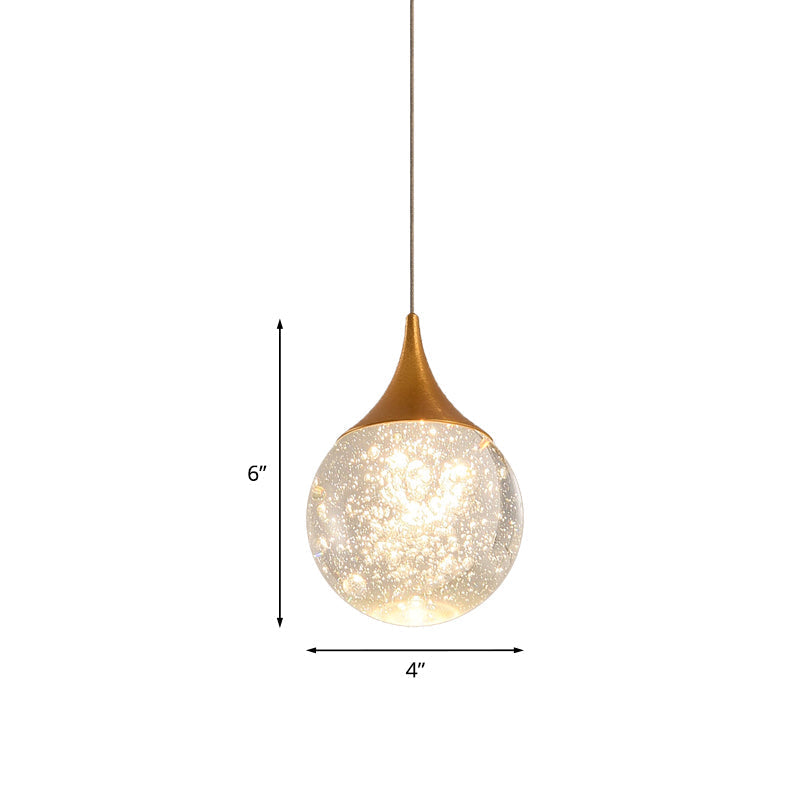 Lampe suspendue simple en forme de boule de cristal à graines pour chambre à coucher