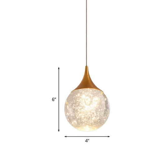 Lampe suspendue simple en forme de boule de cristal à graines pour chambre à coucher